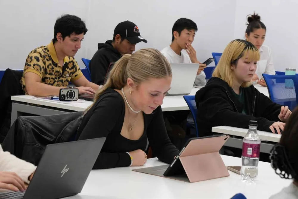Students concentrating on their learning in class